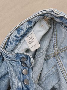 Light Wash Flare Jeans with White Trim