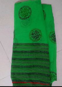 Vibrant Green Saree with Black Floral Motifs