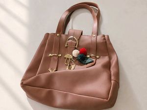 Stylish Brown Handbag with Charms