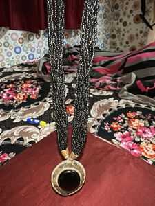 Elegant Beaded Necklace with Black Stone Pendant
