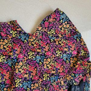 Vibrant Floral Print Peplum Style Shirt