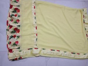 Beautiful Yellow Saree with Floral Blouse