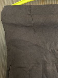 Strechable Brown With Zip And Slit At The Back Sk