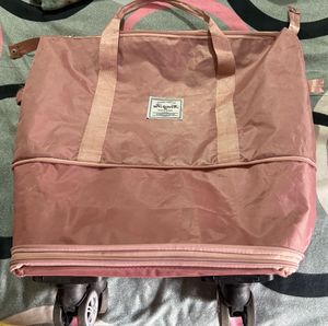 Durable Pink Rolling Travel Bag