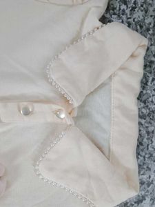Cream Tulle Dress with Flower Accent