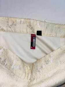 Elegant Lace Pattern Mini Skirt