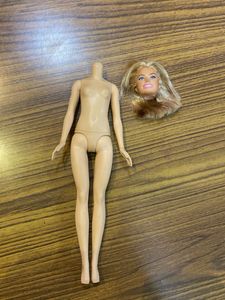 Barbie Doll Head and disney body