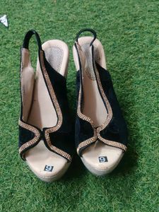 Black And Golden Heels