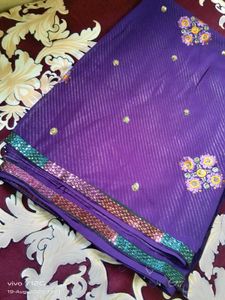 Elegant Purple Saree with Embroidered Details