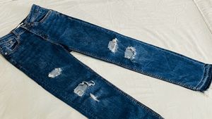 MANGO Ripped Blue Jeans