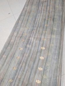 Elegant Striped Saree with Gold Accents