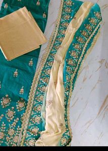 Embroidered unstitched dress material