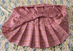 pink pleated checked skirt