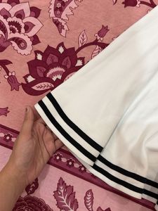 White Pleated Skirt with Black Stripes