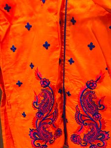 Vibrant Orange Kurta Set with Peacock Embroidery