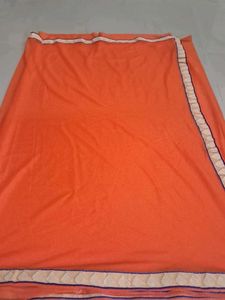 Vibrant Orange Saree with Embellished Border