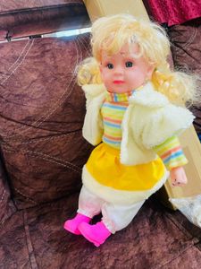 Cute Doll with Blonde Pigtails