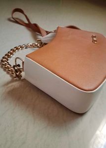Chic Tan Crossbody Bag with Gold Chain