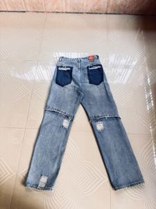Ripped Light Wash Denim Jeans