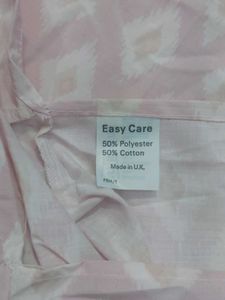 Pink Diamond Pattern Bedspread with frill.