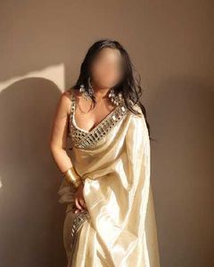 Elegant Cream Saree with Embellished Blouse