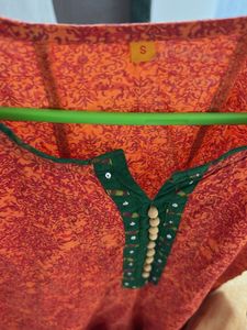 Orange Kurta with Green Neckline