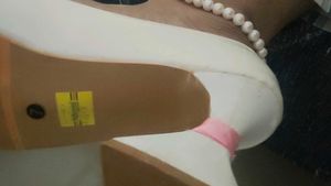 Chic White Heels with Pink Ribbon Detail