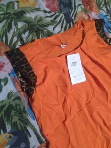 Vibrant Orange Sleeveless Top