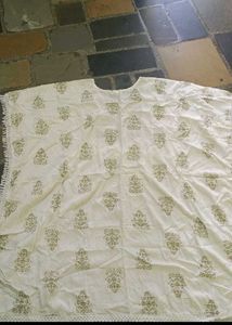 Elegant Cream Kurta Set with Tassels