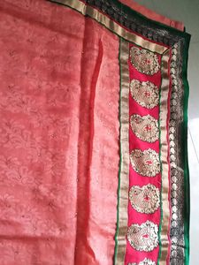 Beautiful netted peach colour Saree