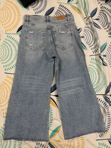 2 Pair Of Ripped Wide Leg And Straight Jeans