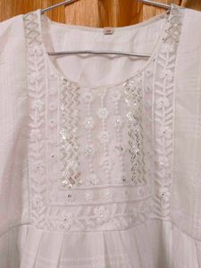 Elegant White Tiered Kurta with Pom-Pom Trim