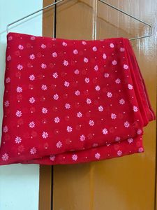 Vibrant Red Saree with Floral Embroidery