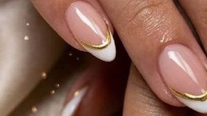 Elegant French Manicure with Gold Accent
