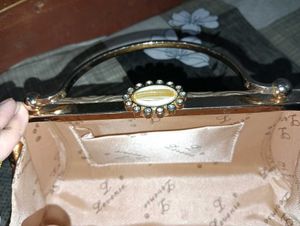 Elegant Gold Embossed Clutch Bag