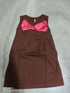 Brand new cotton frock denim feel with contrast bow with zip closure at the side and button at the back