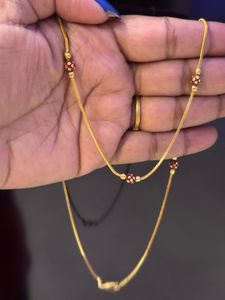 Elegant Gold Chain with Red Beads