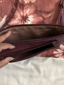 Caprese Burgundy leather sling bag