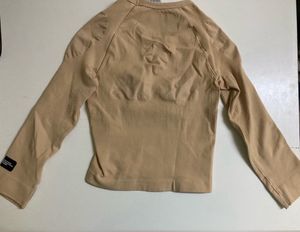 ADIDASWomen Solid Round Neck Beige T-Shirt