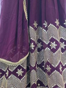 Elegant Purple Lehenga Choli with Gold Embellishme