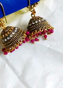Gold Jhumka Earrings with Pink Beads