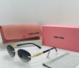Miu-Miu Oval Sunglasses