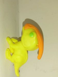 Yellow Toy Figure with Orange Hair