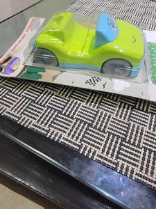 Two toys - Buggy and Racing car to