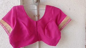 Elegant Pink Blouse with Gold Trim