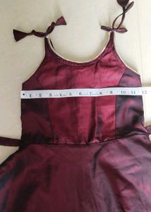 Maroon gown with Gold Border