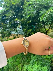 Elegant Gold Oval Bangle Watch