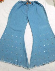 flared jeans with pearl