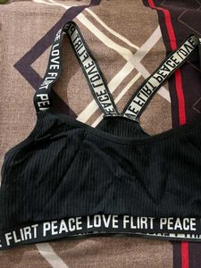 Trendy Black Ribbed Bra with Statement Straps