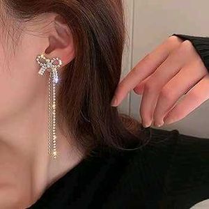 Studded Bow Dangling earrings